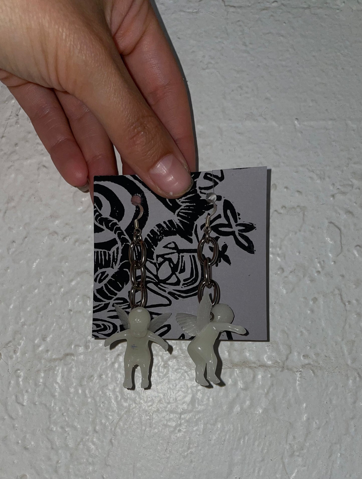 glow in the dark cherub earrings